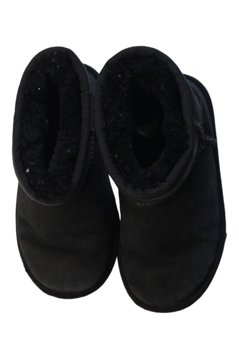 A Black Winter Boots from UGG in size 5T for boy. (Back View)