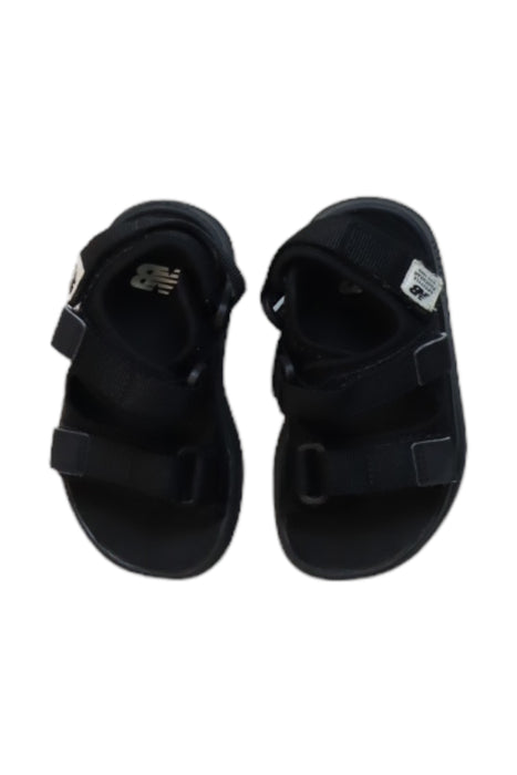 A Black Sandals from New Balance in size 18-24M for boy. (Back View)