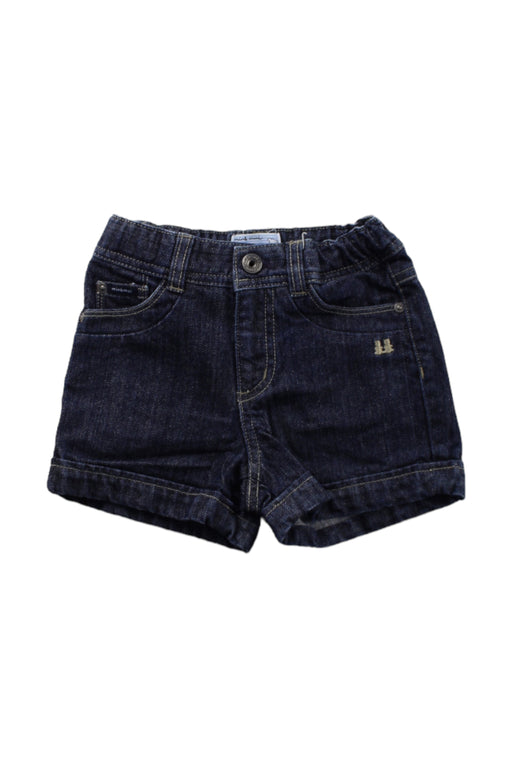 A Blue Shorts from Minkmui in size 2T for girl. (Front View)