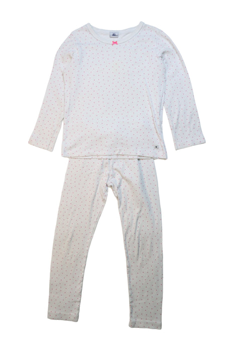 A White Pyjama Sets from Petit Bateau in size 6T for girl. (Front View)