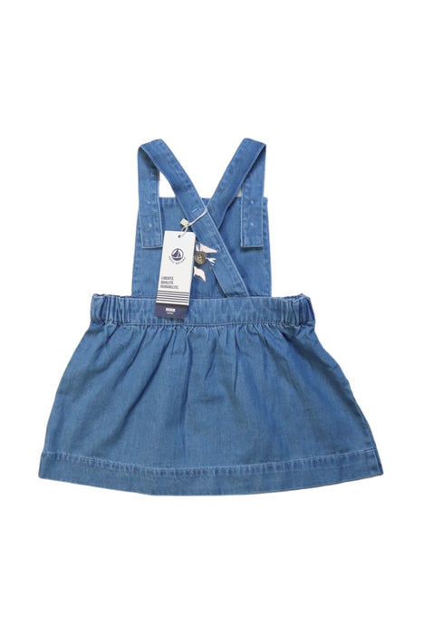 A Blue Overall Dresses from Petit Bateau in size 12-18M for girl. (Back View)