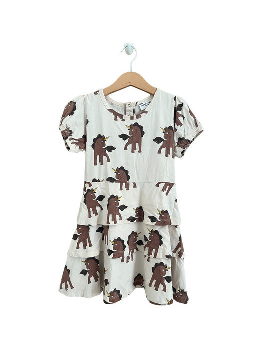 A Beige Short Sleeve Dresses from Mini Rodini in size 6T for girl. (Front View)