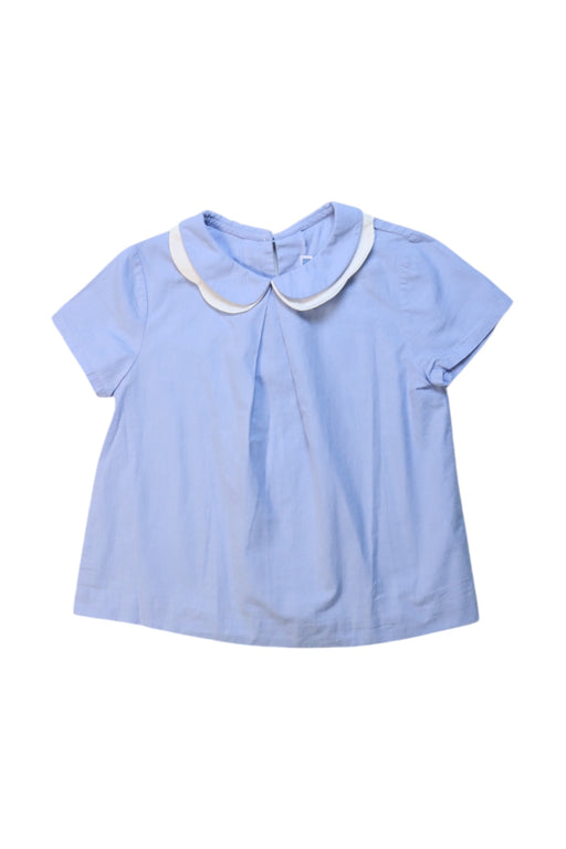 A Blue Short Sleeve Tops from Jacadi in size 6T for girl. (Front View)