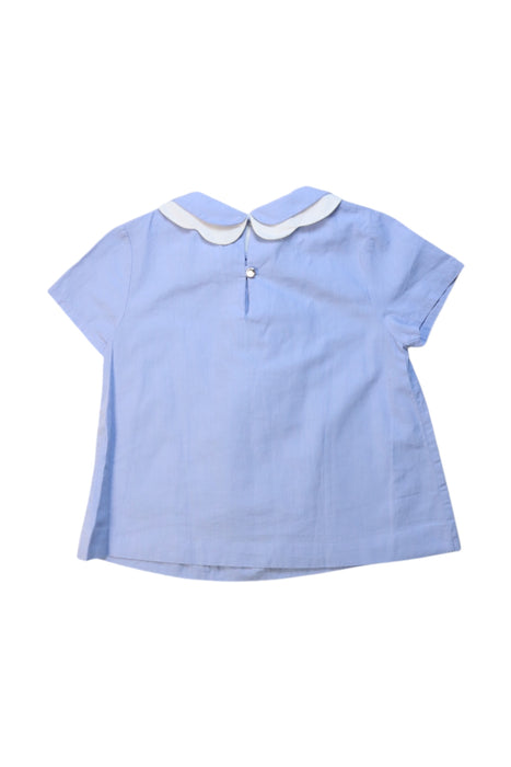 A Blue Short Sleeve Tops from Jacadi in size 6T for girl. (Back View)