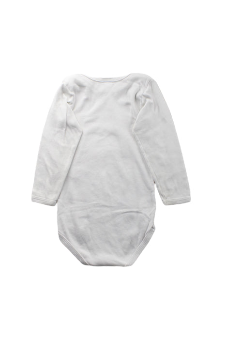 A White Long Sleeve Bodysuits from Petit Bateau in size 2T for neutral. (Back View)