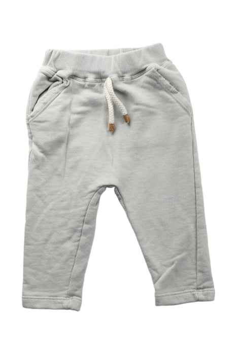 A White Sweatpants from 1 + in the family in size 6-12M for girl. (Front View)