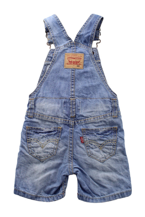 A Blue Overall Shorts from Levi's in size 6-12M for girl. (Back View)