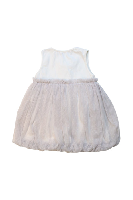 A Ivory Sleeveless Dresses from Le Petit Society in size 2T for girl. (Back View)