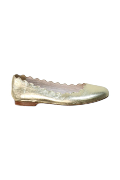 A Gold Flats from Jacadi in size 6T for girl. (Front View)