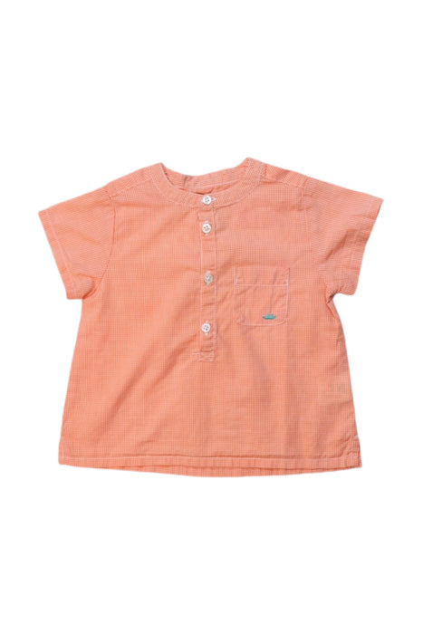 A Peach Short Sleeve Tops from Marie Chantal in size 6-12M for girl. (Front View)