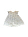 A White Sleeveless Dresses from Cyrillus in size 3-6M for girl. (Front View)