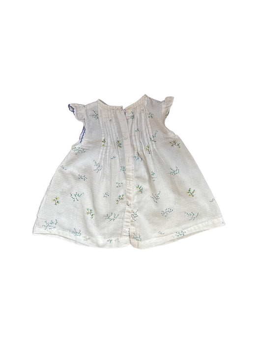 A White Sleeveless Dresses from Cyrillus in size 3-6M for girl. (Back View)