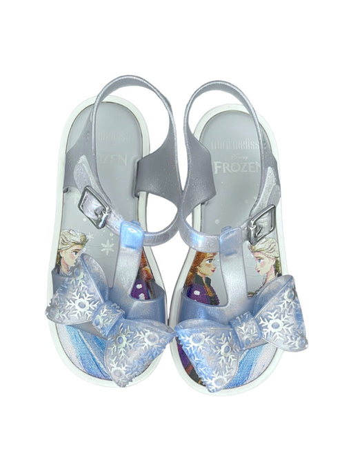 A Silver Sandals from Mini Melissa in size 4T for girl. (Front View)