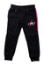 A Black Sweatpants from Air Jordan in size 4T for girl. (Front View)