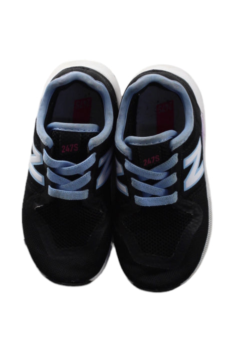 A Black Sneakers from New Balance in size 4T for boy. (Back View)