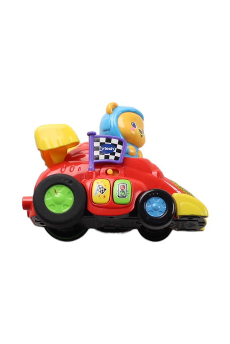 A Red Cars Trucks Trains & Remote Control from Vtech in size O/S for boy. (Front View)