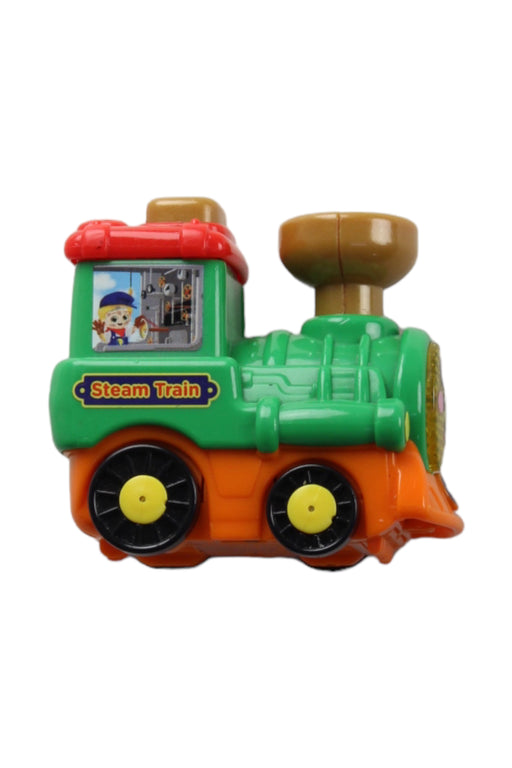 A Green Cars Trucks Trains & Remote Control from Vtech in size O/S for boy. (Front View)