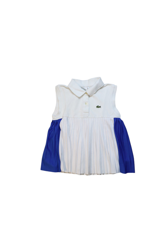 A White Sleeveless Polos from Lacoste in size 6T for girl. (Front View)