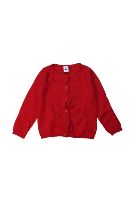 A Red Cardigans from Petit Bateau in size 4T for girl. (Front View)