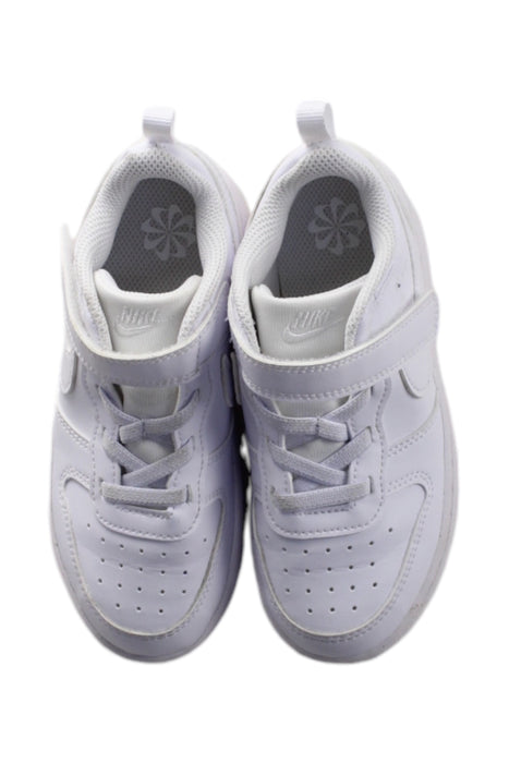 A White Sneakers from Nike in size 4T for girl. (Back View)