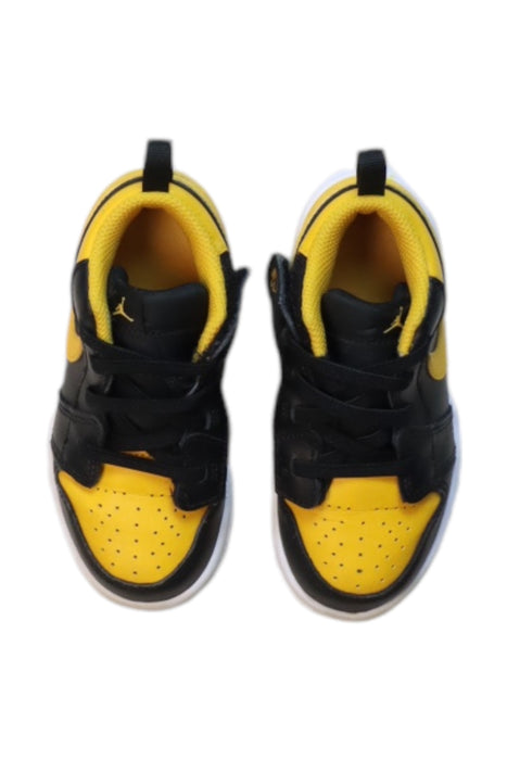 A Yellow Sneakers from Air Jordan in size 4T for boy. (Back View)