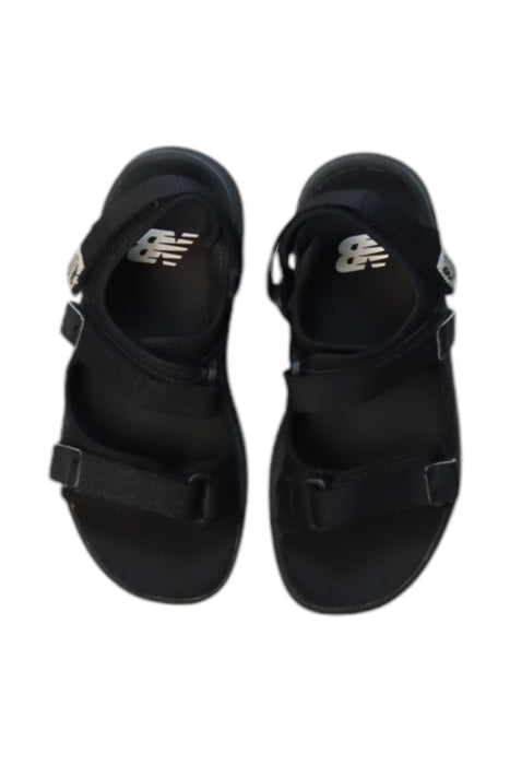 A Black Sandals from New Balance in size 7Y for boy. (Back View)