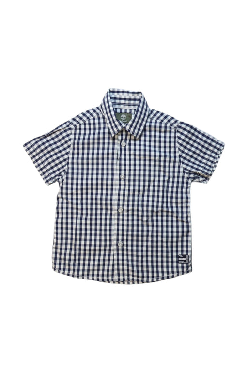 A Navy Short Sleeve Shirts from Timberland in size 4T for boy. (Front View)