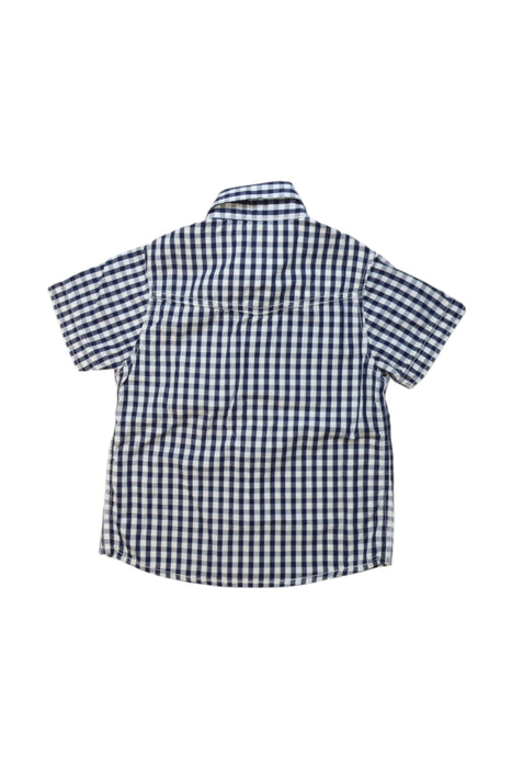 A Navy Short Sleeve Shirts from Timberland in size 4T for boy. (Back View)