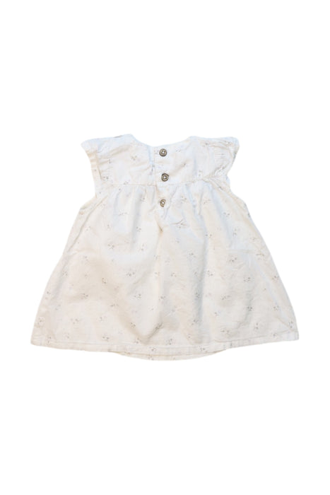 A White Short Sleeve Tops from Newbie in size 6-12M for girl. (Back View)