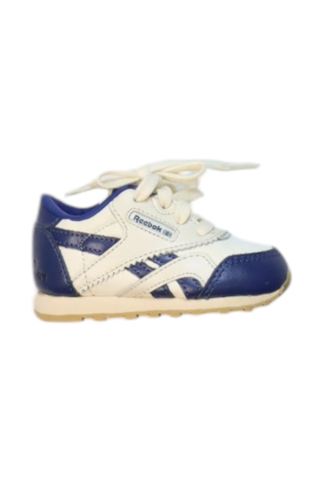 A White Sneakers from Reebok in size 12-18M for neutral. (Front View)