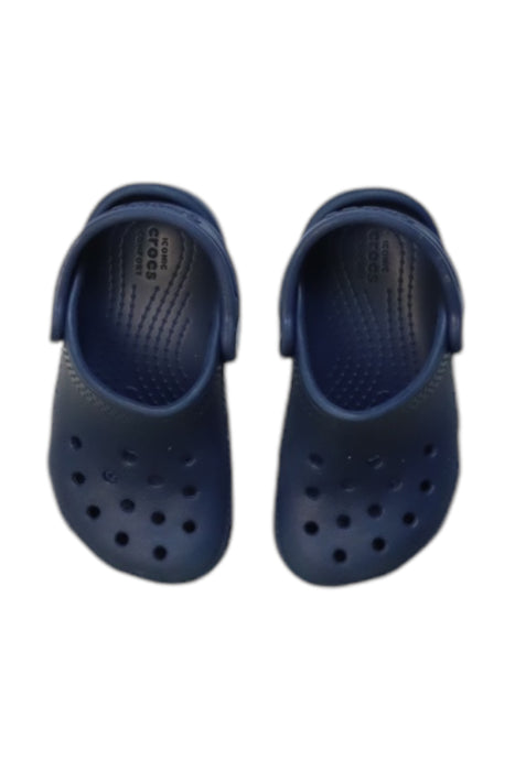 A Navy Slip Ons from Crocs in size 18-24M for neutral. (Back View)