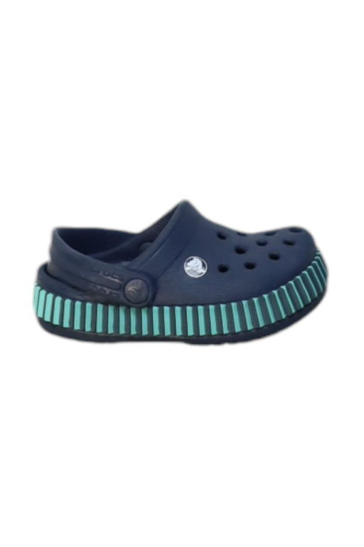 A Navy Slip Ons from Crocs in size 12-18M for neutral. (Front View)