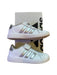 A White Sneakers from Adidas in size 6T for neutral. (Back View)