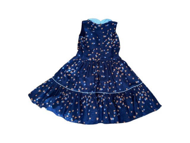 A Navy Sleeveless Dresses from Comme Maman Collection in size 6T for girl. (Back View)