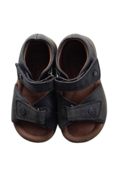 A Navy Sandals from Clarks in size 18-24M for neutral. (Back View)