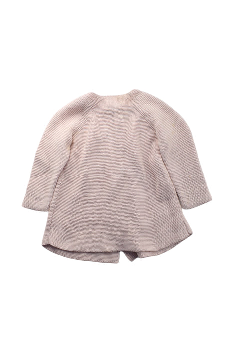 A Pink Coats from Nanos in size 12-18M for girl. (Back View)