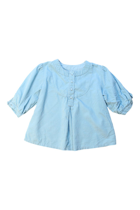 A Blue Long Sleeve Tops from Jacadi in size 6T for girl. (Front View)