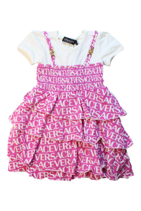 A White Short Sleeve Dresses from Young Versace in size 6T for girl. (Front View)