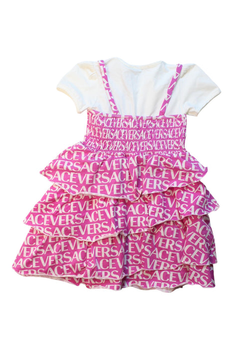 A White Short Sleeve Dresses from Young Versace in size 6T for girl. (Back View)