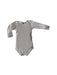 A Beige Long Sleeve Bodysuits from Petit Bateau in size 12-18M for girl. (Front View)