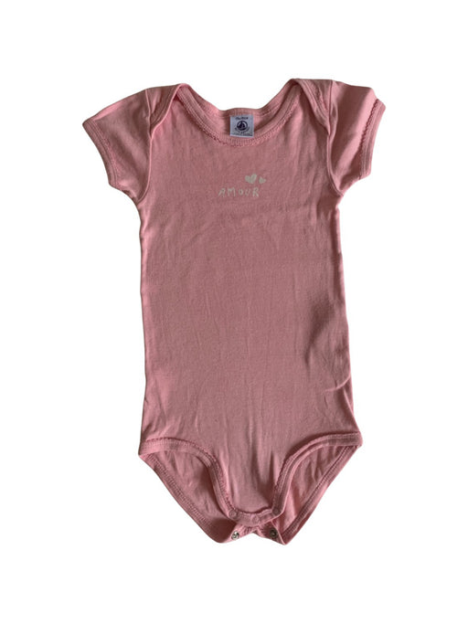 A Pink Short Sleeve Bodysuits from Petit Bateau in size 12-18M for girl. (Front View)