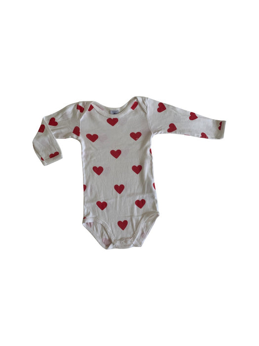 A White Long Sleeve Bodysuits from Petit Bateau in size 12-18M for girl. (Front View)