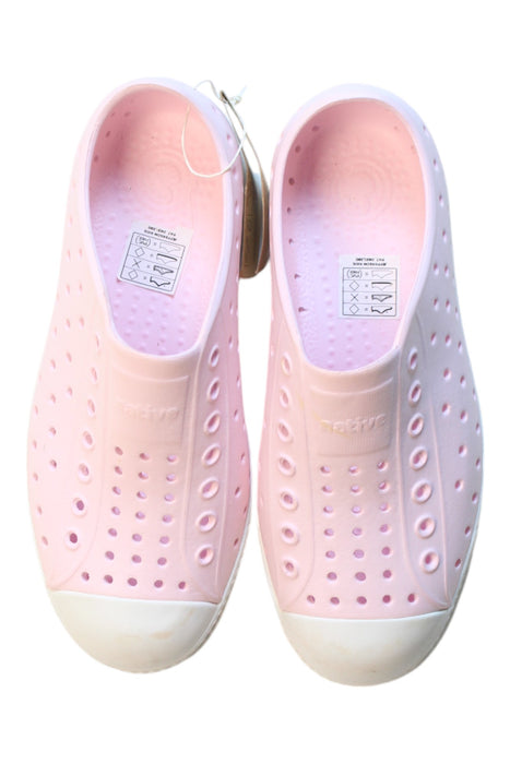 A Pink Sneakers from Native Shoes in size 7Y for girl. (Back View)