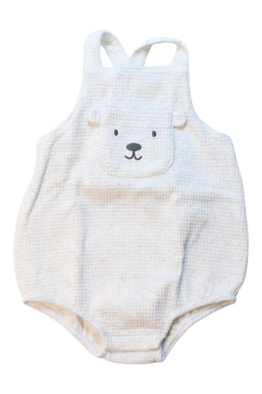 A Ivory Sleeveless Rompers from Seed in size 6-12M for girl. (Front View)