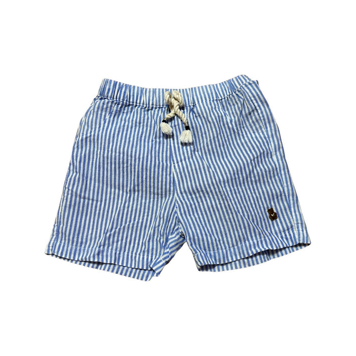 A Blue Shorts from Organic Mom in size 12-18M for boy. (Front View)