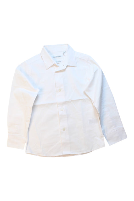 A White Long Sleeve Shirts from Calvin Klein in size 5T for boy. (Front View)