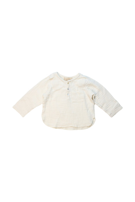 A Ivory Long Sleeve Tops from La Petite Collection in size 6-12M for girl. (Front View)