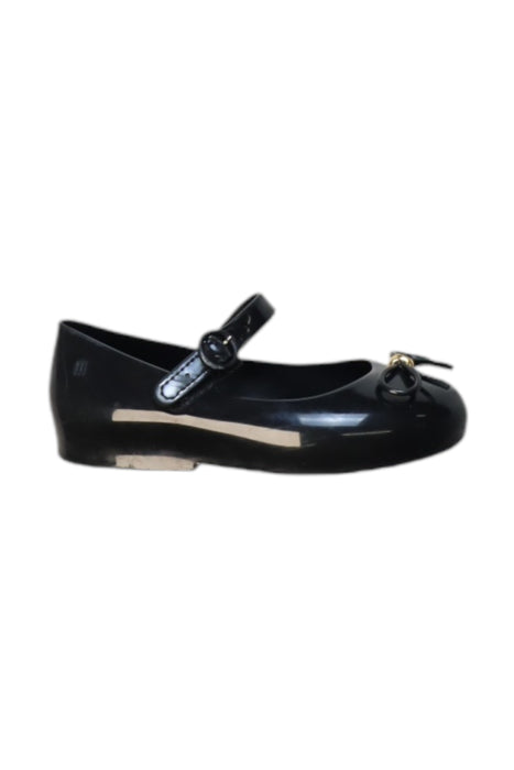 A Black Flats from Mini Melissa in size 5T for girl. (Front View)