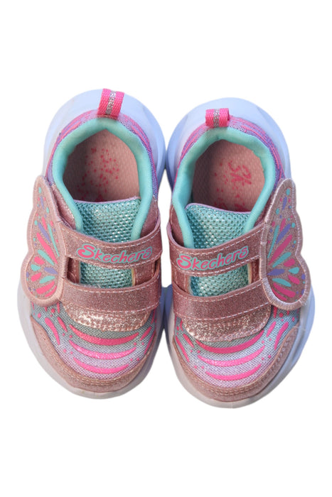 A Pink Sneakers from Skechers in size 12-18M for girl. (Back View)