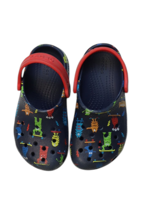 A Multicolour Slip Ons from Crocs in size 4T for girl. (Back View)